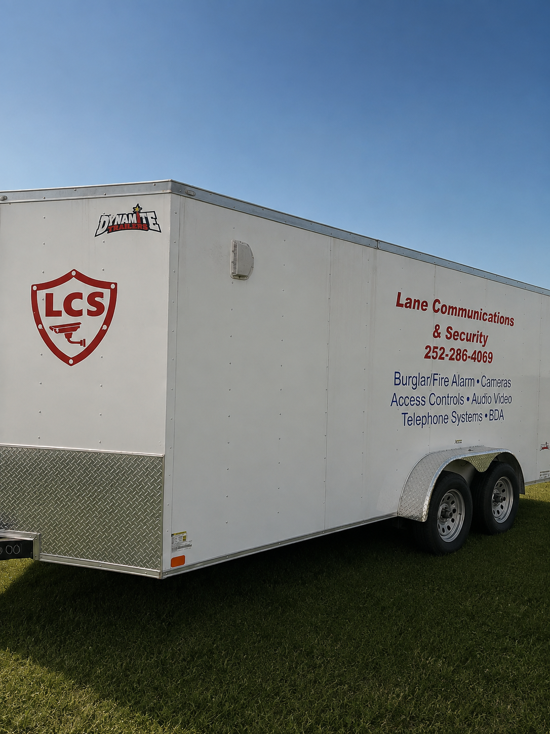 LCS service trailer with company logo and contact information